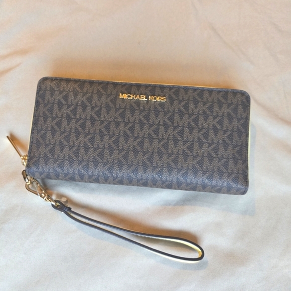 Michael Kors Handbags - Michael Kors Signature Wristlet in Dark Brown